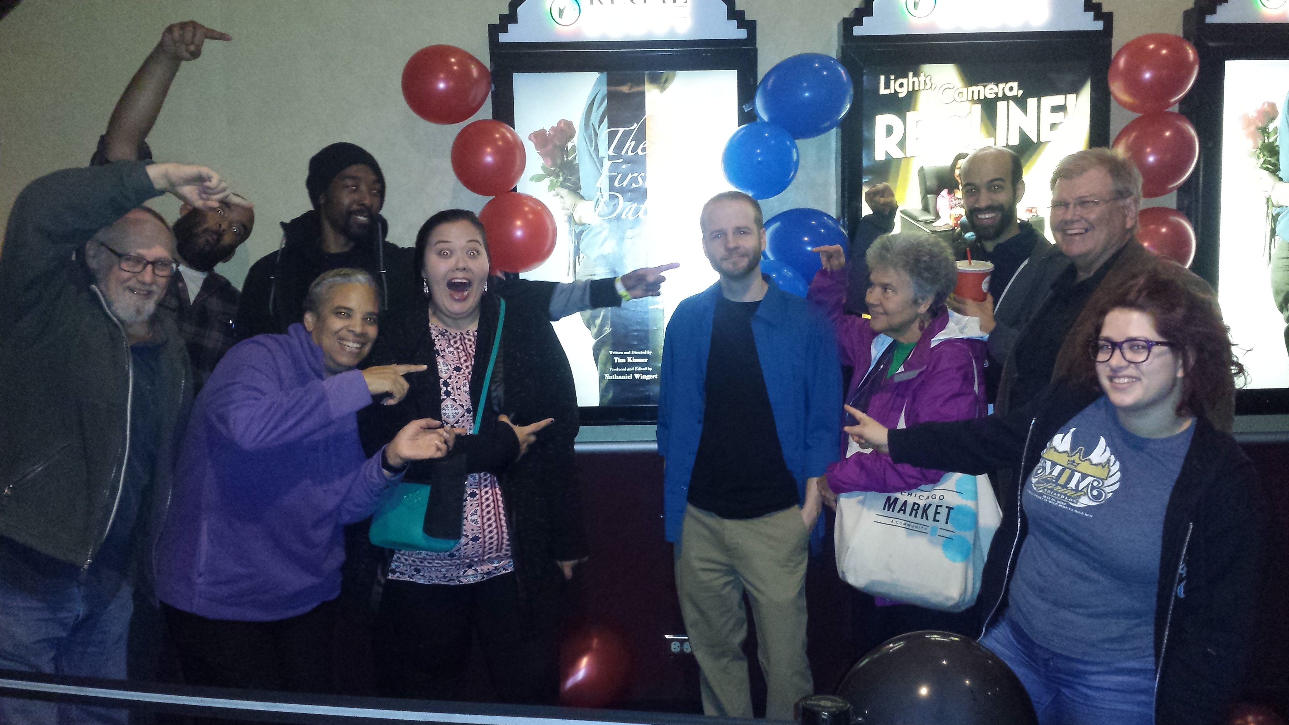 Group of diverse people celebrating at Foundation for Intentional Community event.