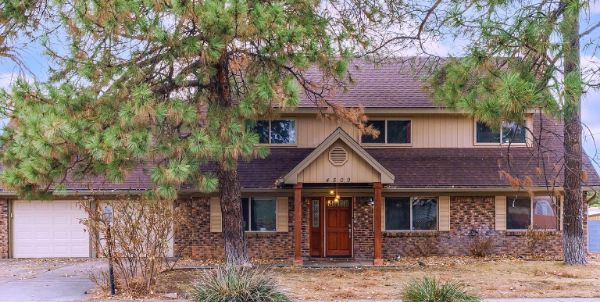 Veldt House, a community living home with brick and wood exterior.